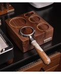 Straight Up Organized Espresso Tamper Station With Universal 51 To 58mm Base And Built In Powder Dispenser Premium Walnut Barista Organizer displaying portafilter with coffee grounds.