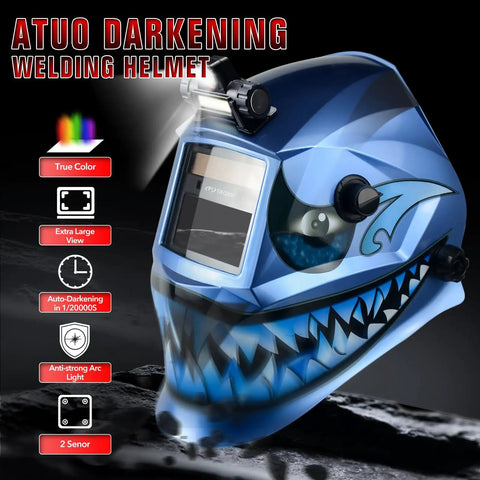 Clear view of auto darkening welding helmet with true color view and light lens. Blue design with shark graphic on side.