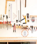 Heavy Duty 20 Amp 250 Volt NEMA 6-20 Duplex Receptacle in workshop setting with various tools