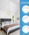 Straight Up Gold Plug In Pendant Light With 16 Foot Long Cord And Sparkling Three Tier Crystals for cozy bedroom with a gray bed.