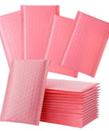 Pink Bubble Padded Mailers Self Seal Envelopes 100 Pack for jewelry and makeup supplies, stack in a pile showing bubble texture