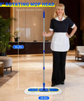 No Fuss Heavy Duty Commercial Dust Mop With 29.5 Inch Head And 61 Inch Handle in a lobby setting used for cleaning floors.