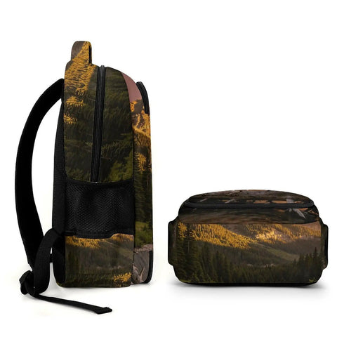 Golden Hour Creek Printed Unisex Backpack side view with forest design, durable polyester, large capacity for school travel hiking.