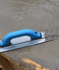 Pro-Grade Magnesium Concrete Float 3-1/8 x 16 In With Beveled Ends And Rounded Corners on wet concrete slab