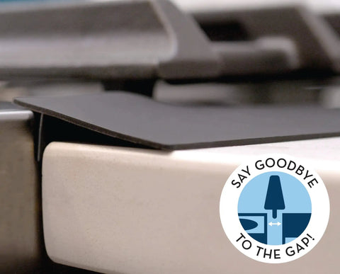Close-up of Stove Gap Cover And Crumb Guard Silicone 20.5 Inch By 2.3 Inch Matte Black Pack Of 2 filling stove-counter gap.