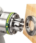 Pro Grade Four Inch Heavy Duty Wood Lathe Chuck Built Dang Tough With High Tensile Steel attached to wood faceplate ring.