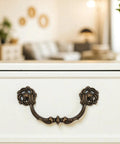4-Pack Antique Brass Drawer Pulls 4.5 Inch Center-to-Center Drop Bail Dresser Handles Vintage Style Bronze Look Hardware on White Drawer