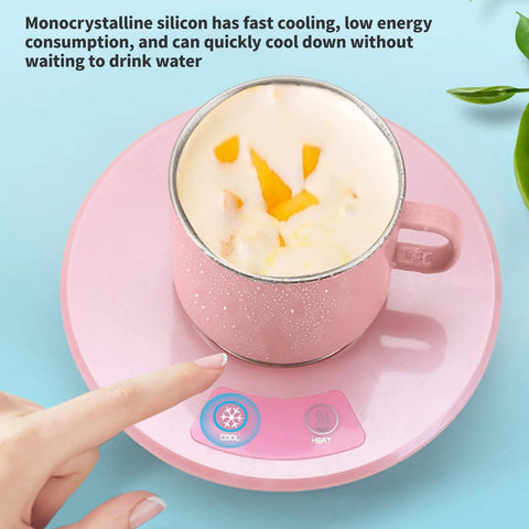 Electric Desk Cup Warmer And Cooler For Coffee Mugs Cans Bottles Precise Hot Cold Temp Control Keep Your Daily Brew Cozy Or Truly Ice Chill Home Office Game Changer Easy Wipe Surface on a pink platform with controls and a beverage.