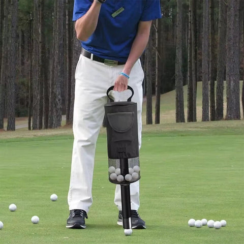 Person using Portable Golf Ball Retriever With Detachable Tube And Large Mesh Pocket That Holds 70 Plus Balls on a golf course.