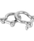 Close-up of two stainless steel D ring shackles from the 14 Pcs Clevis Shackle Set Five Sixteenth Inch Screw Pin Bow D Ring Shackles Stainless Steel 304 Heavy Duty For Anchor Towing Off Road Recovery M8 Chain Shackles.
