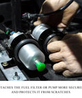 Close-up of Badass 50mm Aluminum Fuel Filter Mounting Bracket And Lock Tight Fuel Pump Clamp Holder securing fuel pump with rubber cushion.
