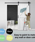 Rock Solid 72X84 K Shape Barn Door Crafted From Premium Kiln Dried MDF With Full Hardware Kit showing a child painting the door.