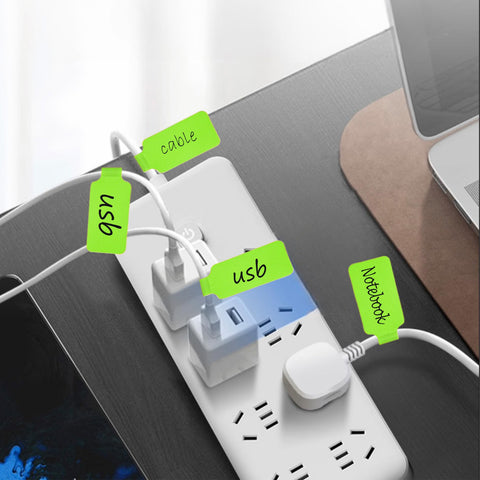 Pro Grade Ultimate Cable Management Kit 61 Piece Set With 30 Cable Labels organizing power cords on a power strip.