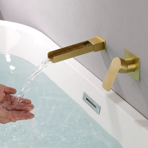 Wall Mount Waterfall Tub Faucet With Extra Long Spout, High Flow Bath Filler, Brushed Gold Finish showing water flow into tub