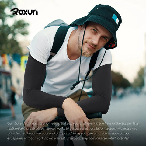 Man wearing Cooling Arm Sleeves With UPF Fifty Plus Sun Protection For Men And Women Seamless Sport Compression For Outdoor Activities