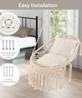 Macrame Swing Chair For Indoor Outdoor Living, Heavy Duty Hanging Porch Swing With Soft Cushions, Cotton Rope And Hardware Kits, Supports Up To 330 Lbs, Oval Hammock Style Chair For Patio Balcony Beige in bedroom setting with installation components displayed