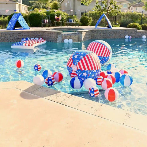 Colorful inflatable beach balls floating in a pool, part of a collection including the White 11 Inch Inflatable Beach Balls, 12 Pack for Pool Parties and Beach Games.