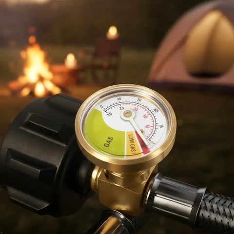 Close-up of gauge on stainless steel braided RV propane hose, showing gas levels for camper tanks, fire background.