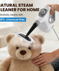 No Sweat Handheld Steam Cleaner For Home, Portable Steam Mop For Deep Cleaning With 15 Accessories, Fast Heating 1050W Handheld Steamer cleaning a teddy bear.