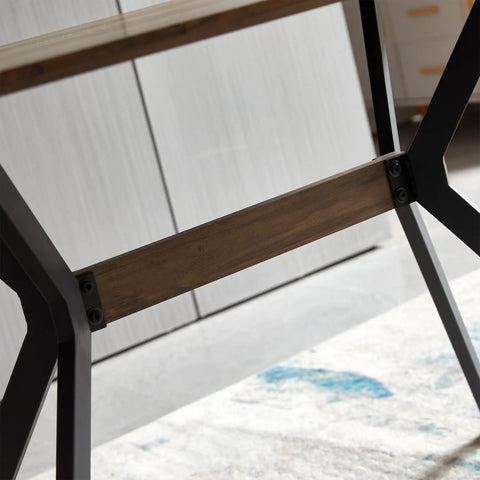 Modern Wood Top Dining Table With Sturdy Black Metal Base and Center Shelf For Kitchen or Office close-up of the frame and support.