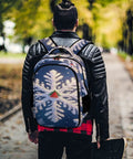 Christmas Frost Snowflake Print Unisex Backpack With Large Capacity Durable Polyester Material worn by person outdoors