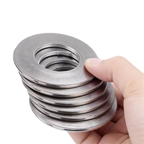 Ten Piece Bucket Pin Shim Kit For Excavators And Skid Steers, Fits 30 To 120 mm Pin Diameter, 1 2 3 5 mm Thick Shims, Tightens Loose Joints, Keeps Dust Out, Extends Grease Intervals, Beefed-Up Steel Construction, stacked steel shims in hand