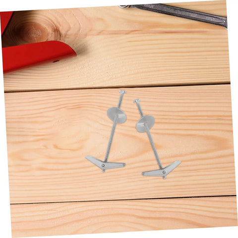 Heavy Duty Toggle Bolts And Wing Nuts Kit on wooden surface, carbon steel fasteners for drywall mounting and hanging heavy stuff.