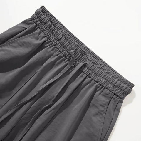 Close-up of Women Lightweight Quick Dry Cargo Hiking Pants With High Waist Fit All Day Comfort Stretchy Parachute Style Baggy Travel Joggers.