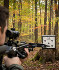 Archer aiming at Backyard Crossbow Target With 650 FPS Stopping Power 250 FP Kinetic Energy in forest