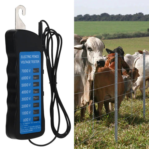 Ranch Ready Heavy Duty Electric Fence Voltage Tester showing neon readings and cows near a fenced pasture.