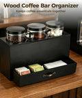 Wood Coffee Bar Organizer Countertop Dispenser Rack With 3 Clear Jars And Pullout Drawer For Coffee Beans Sugar Tea Storage on kitchen counter.