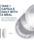 Glass of water and single lithium orotate 5mg capsule, promoting daily intake with meal for mood and memory support.
