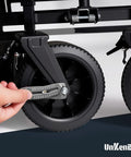 Person using Gen2 Bolt Size Finder Tool Keychain to measure nut size on a black wheel. Gen2 Bolt Size Finder Tool Keychain For Measuring Nuts And Bolts SAE Five Thirty Second Inch To One Inch And Metric Four To Twenty Five Millimeter Wrench And Socket Size Finder Nut And Bolt Fastener Measuring Tool Gift For Makers Gearheads And DIYers.