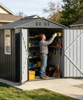 Outdoor Storage Shed With Window Lockable Garden Toolhouse for Backyard Use, Ventilated, Light Grey, 6x4FT with open doors on concrete base.