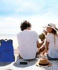 Couple on beach with Two-Pack Lightweight Foldable Backpack Set Water-Resistant Packable 20L Travel Hiking Bags Navy Blue and Royal Blue