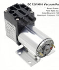 Front view of DC 12V mini vacuum pump with black plastic valve block and silver motor on a metal mounting base.