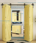 66 Inch Bi Folding Sliding Barn Door Hardware Kit With Five And A Half Foot Heavy Duty Track And Rollers For Up To Four Fifteen Inch Wide Doors Smooth Quiet Operation Easy Install Black Finish No Door Panel Included Ready To Roll installed view