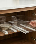 Smooth As Silk Drawer Slides Two Pack No Drill Pull Out Rails For Cabinet Organizers in use with clear storage bins.