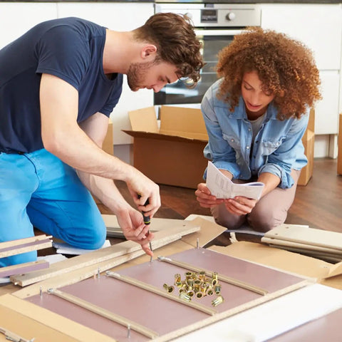 Couple assembling furniture using Rivet Nut Inserts Kit Pro Grade 500 Pcs Carbon Steel Threaded Nut Inserts Galvanized Finish Sizes M3-M10