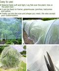20Ft By 25Ft Fine Mesh Garden Netting With Insect Barrier installed over plants, showing close-up of netting being cut to size.