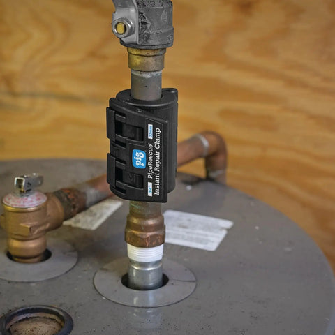 Instant Pipe Leak Repair Clamp Kit installed on a metal pipe for a watertight fix. Works under pressure for quick repairs.