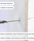Close-up of 200 Piece Self Drilling Drywall Anchors Kit With 100 Self Tapping Screws For Drywall Mounting, showing installation on wall.