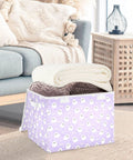 Smooth Folding Storage Bin With Grippy Handles And Snug Velcro Cover Collapsible Oxford Fabric Tote For Closets And Dorm Rooms, filled with blankets.