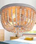 Wood Beaded Chandelier 3 Light Semi Flush Mount Boho Farmhouse Ceiling Light In Oak White Finish, lit with warm glow in room