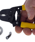 Hella Versatile Data T Cutter Wire Tool For Structured Networks And Coax Cables Up To Rg 11 in hand, cutting coax cable.