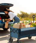 Heavy Duty Collapsible Wagon Cart With Brakes 200L Large Capacity Folding Utility Wagon next to car trunk with groceries