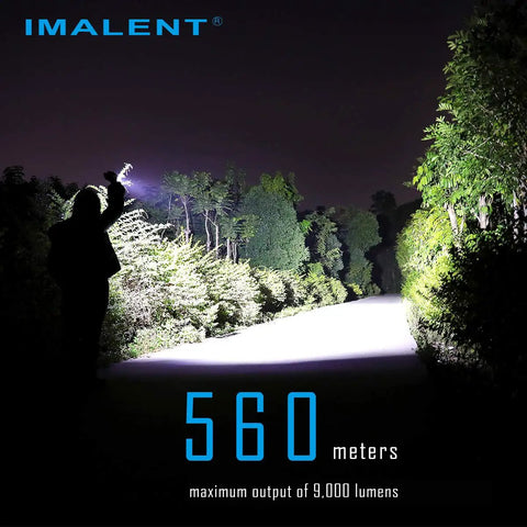 Person using flashlight to illuminate a pathway at night, demonstrating 560-meter beam of Ms03 13000 Lumen LED Flashlight.