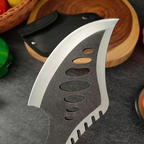 Close-up of Beast Fixed Blade Axe Knife with saw back, featuring a black sheath in the background, for outdoor and survival use.