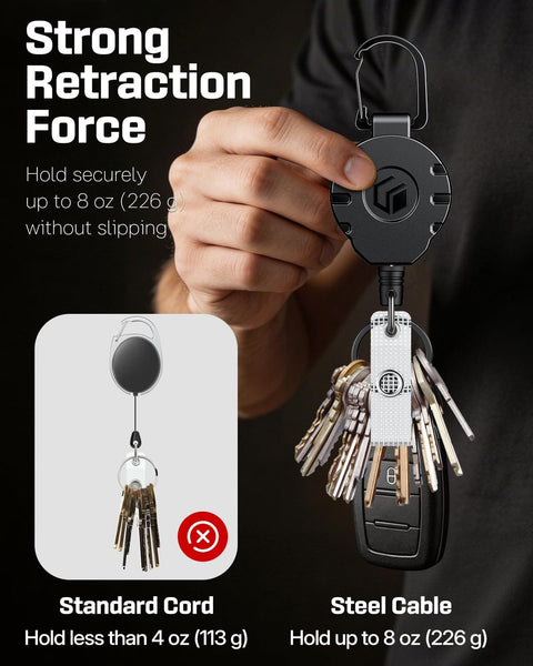 Person holding heavy duty retractable keychain with carabiner badge reel for ID holder up to 8 oz, featuring strong retraction.