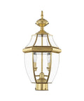 Monterey 2 Light Outdoor Post Light In Polished Brass Finish With Solid Brass Construction And Clear Beveled Glass, front view.